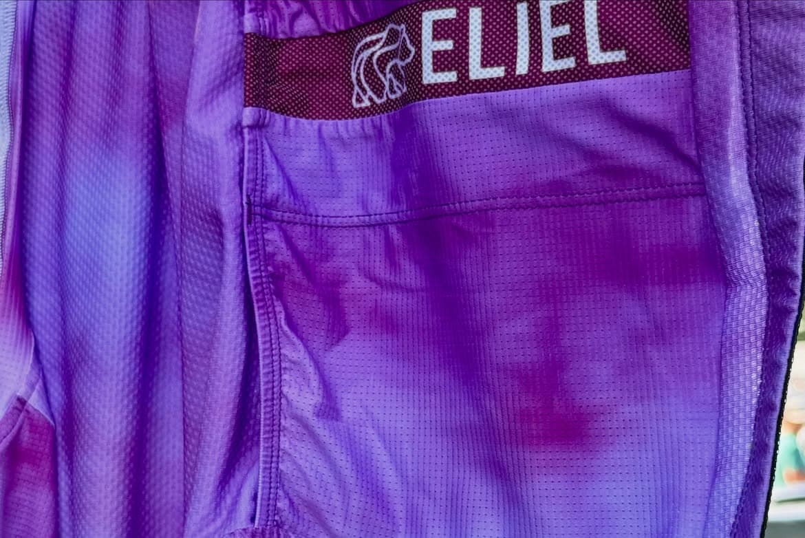 Close-up of a purple Eliel jersey pocket and fabric texture
