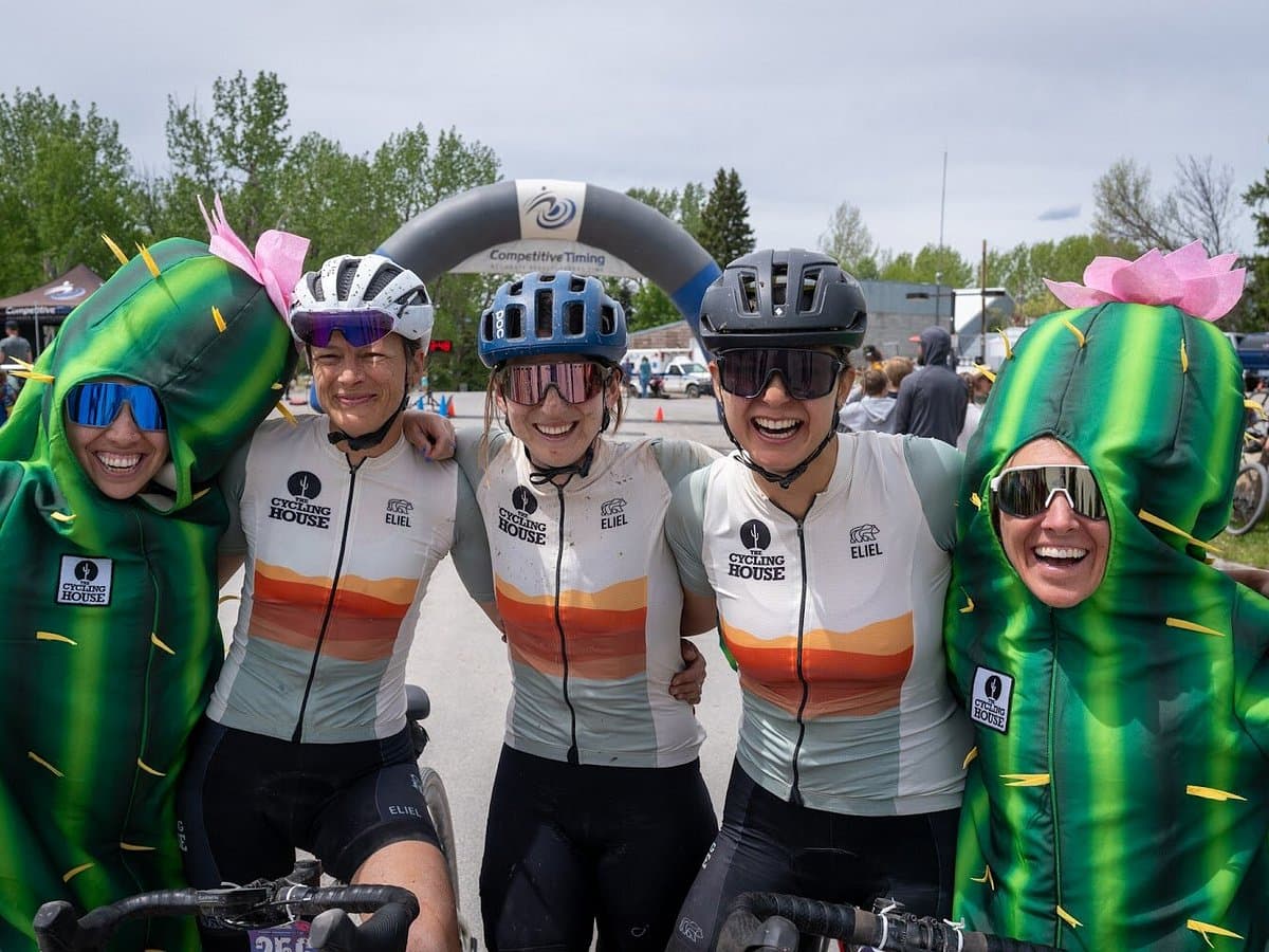 Cycling House riders celebrating with teammates in cactus costumes