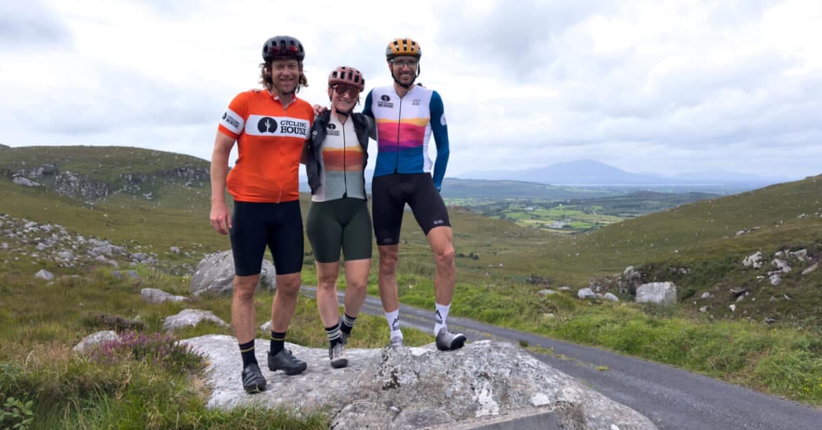 Cycling House staff wearing team jerseys in the Irish countryside