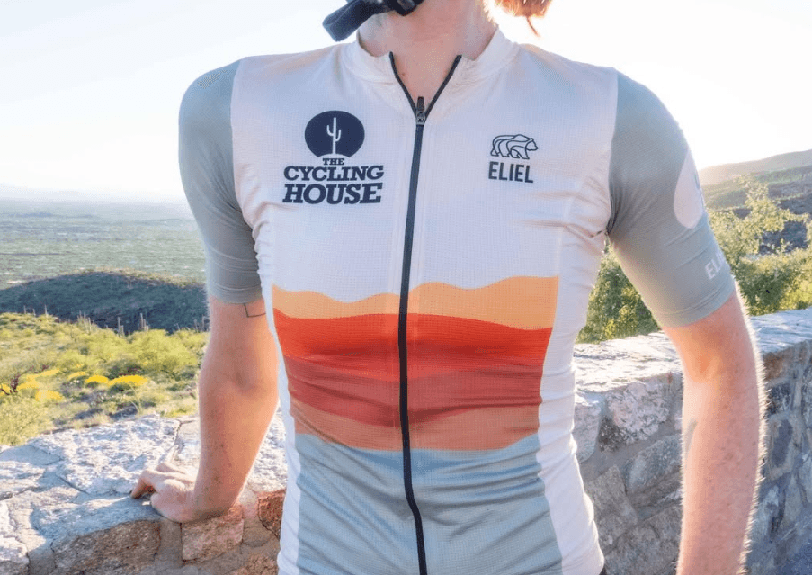 Close-up of the desert-tone Cycling House jersey in the landscape