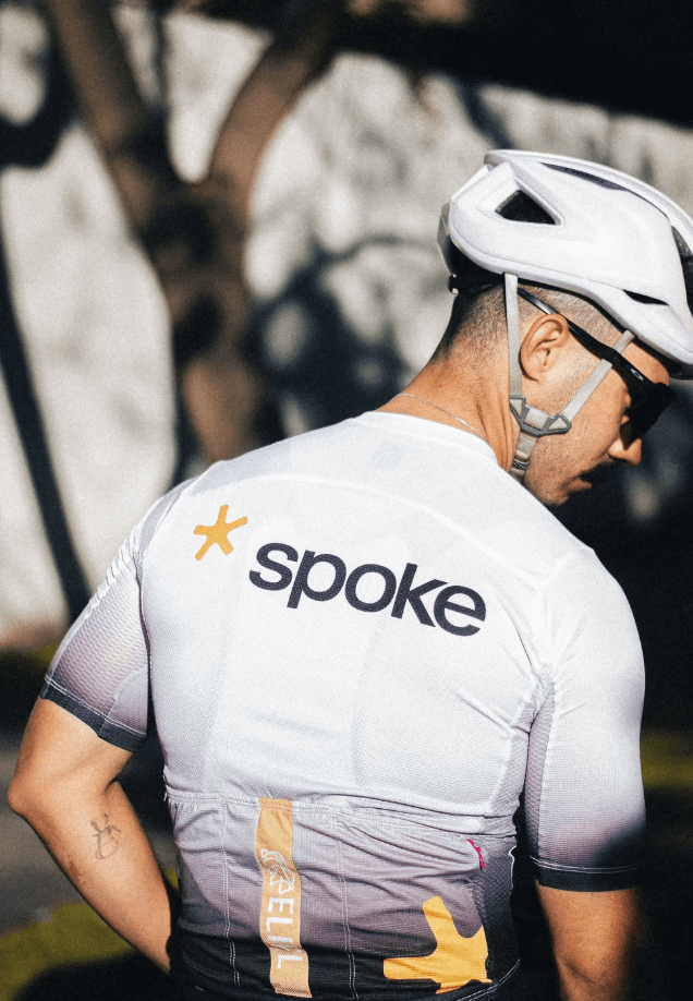 Rider wearing a Spoke cycling jersey