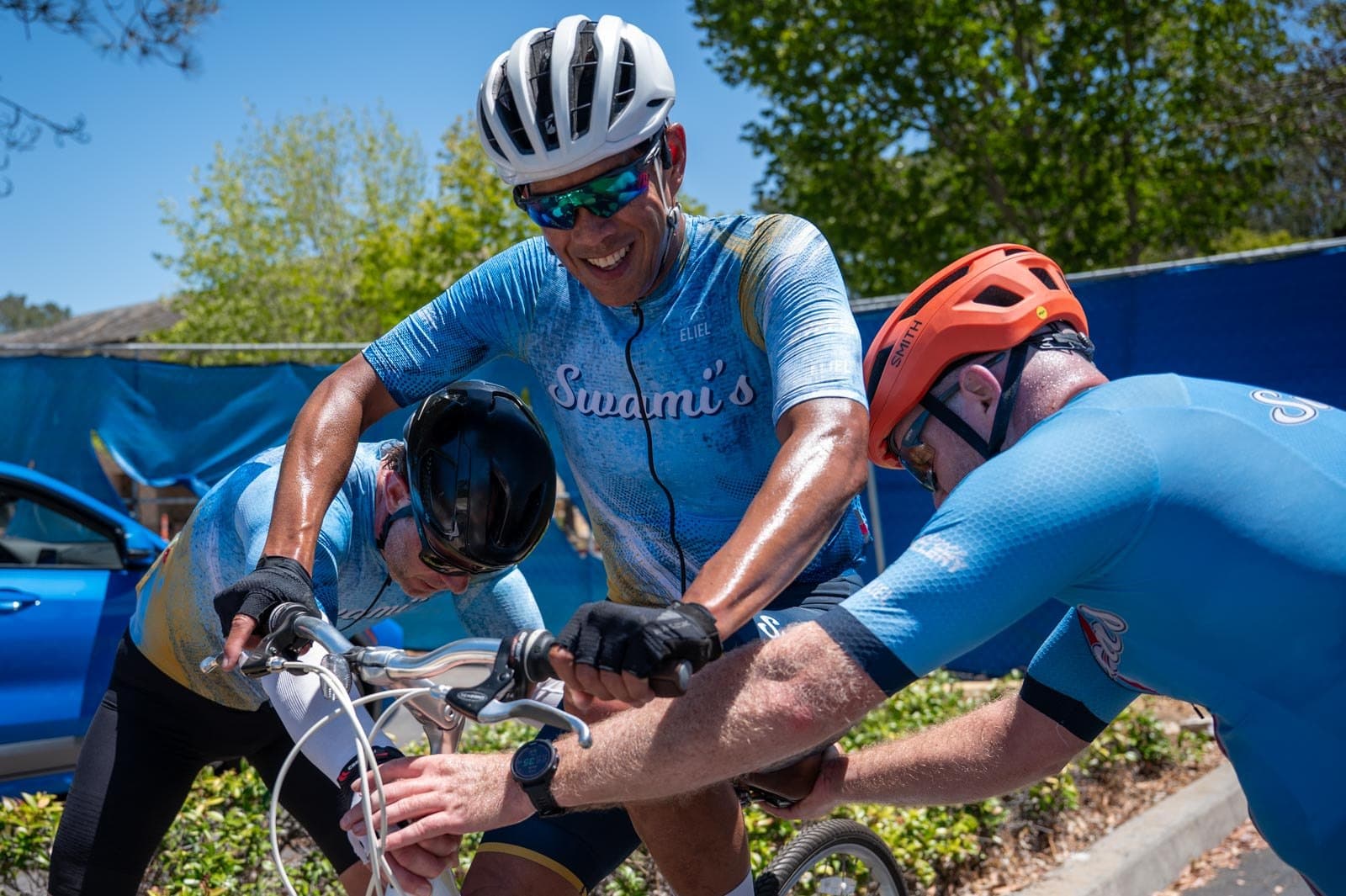 Swami’s cyclists gathering with their bikes at a team event