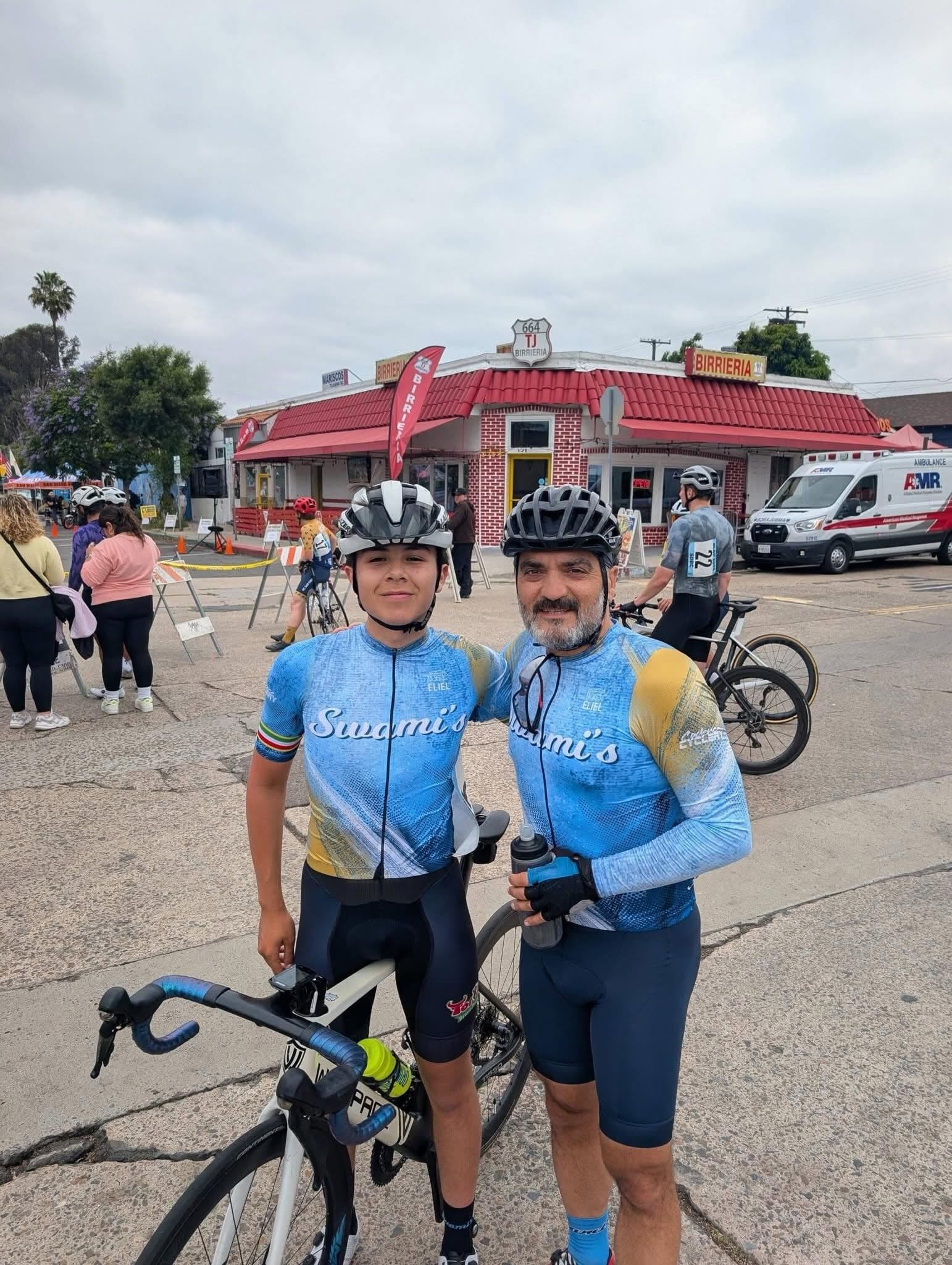 Two riders wearing Swami’s main design at a cycling event